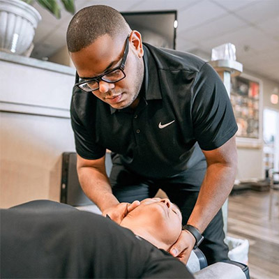 Chiropractor Miami Lakes FL Ramon Reyes Adjusting Patient Chiropractor Miami Lakes FL Ramon Reyes Adjusting Patient